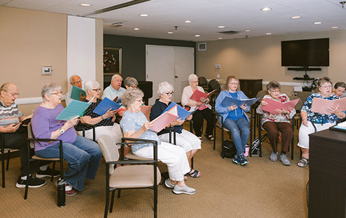 Residents singing in a choir. Links to Gifts of Cash, Checks, and Credit Cards cash.jpg