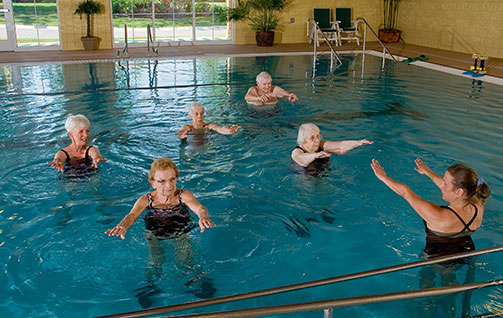 Residents pariticipating in water aerobics. Links to Gifts of Appreciated Securities securities.jpg